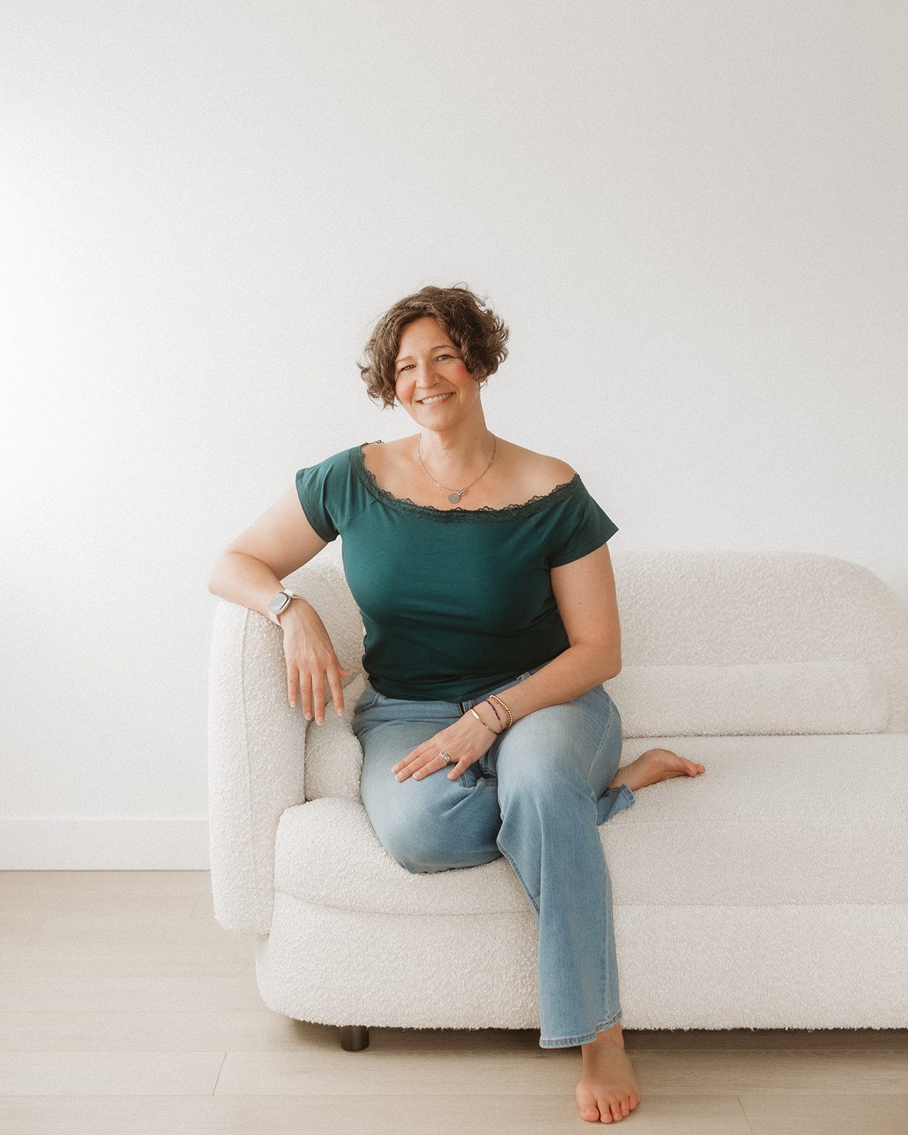 Mandy Kuelz portrait, seated, smiling