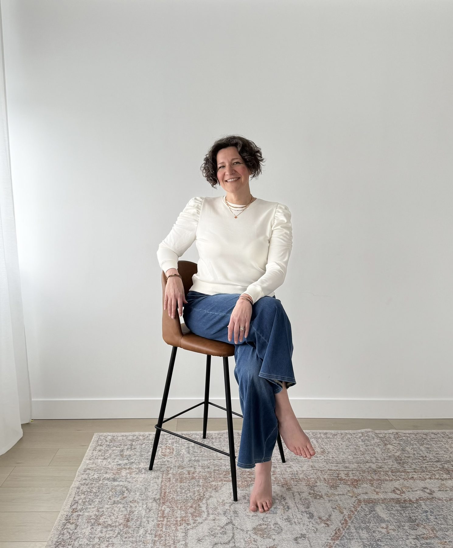Mandy Kuelz seated portrait, smiling